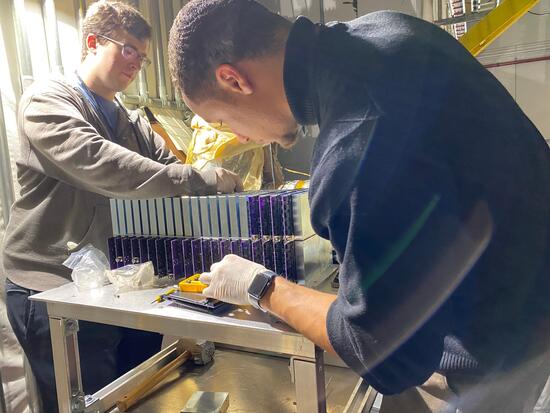 Sean Preins and Peter Carney assemble prototype