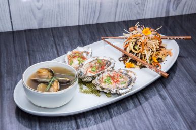 Plate of clams and bowl of soup