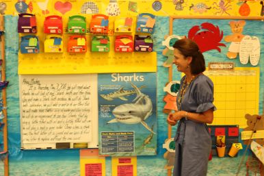 Carter, in her kindergarten classroom, explaining the lesson plan for “shark day.”