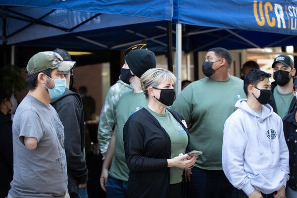 UCR staff, students, alumni, and other guests attend the Veterans Resource Center grand opening event on February 24, 2022, at UC Riverside. The VRC moved from Bannockburn Village to Costo Hall over the summer. (UCR/Stan Lim)