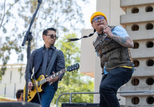 Simon Tam (left) and Aron Moxley of The Slants perform on Tuesday, April 25, 2023 at UC Riverside. (UCR/Stan Lim)