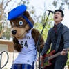 The Slants' Simon Tam with Scotty during the inaugural CHASS Dean's Speaker Series on Tuesday, April 25, 2023 at UC Riverside. (UCR/Stan Lim)