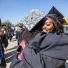 Graduates hugging