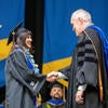 Graduate shaking hands with Chancellor