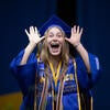 BCOE graduate smiling excitingly
