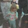Kids examining live butterflies