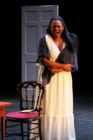 Jasmine Muhammad portraying Emily Dickinson in "Emily & Sue." Music composed by UC Riverside's Dana Kaufman. (Photo by: Aiden K. Feltkamp)