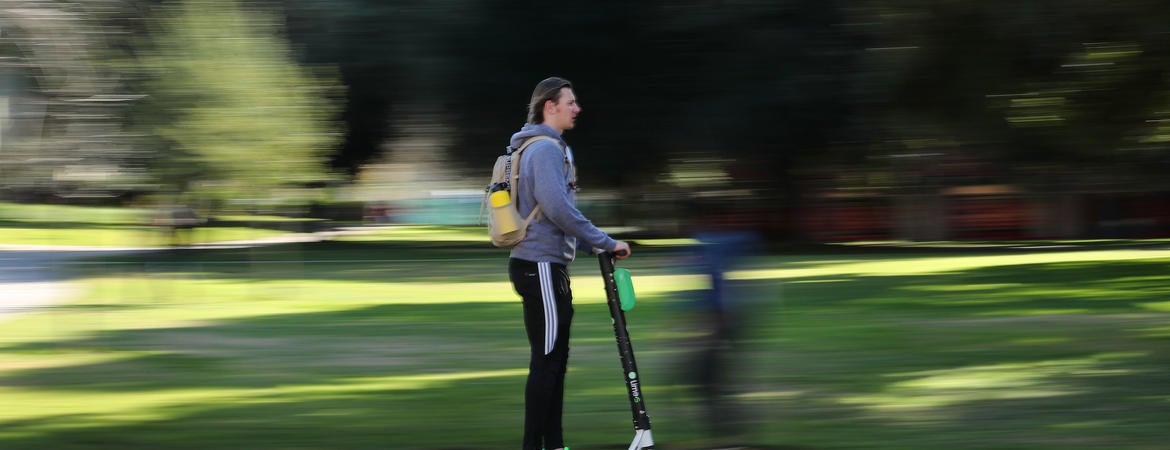 Student on scooter