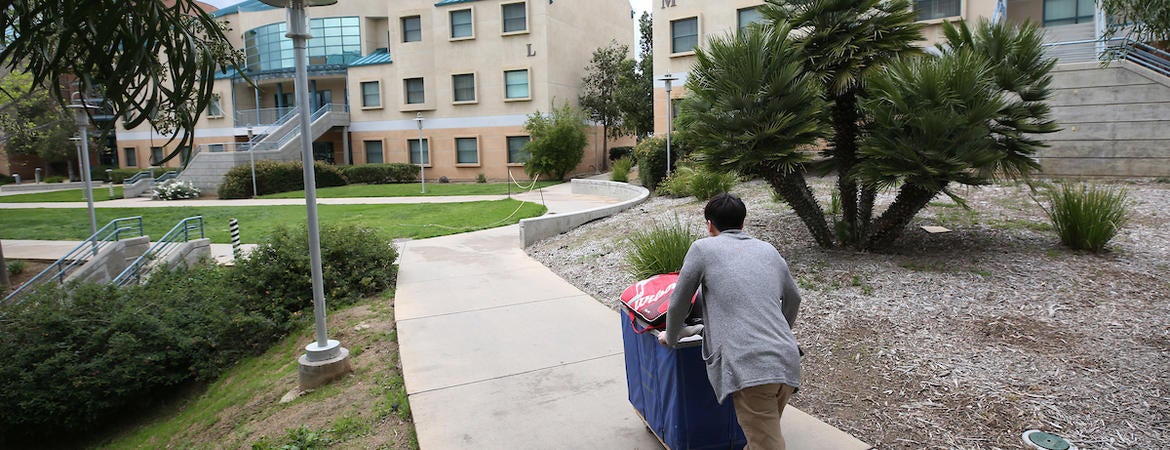 Staff remain on campus to support students who are moving out, and those are are staying. (UCR/Stan Lim)