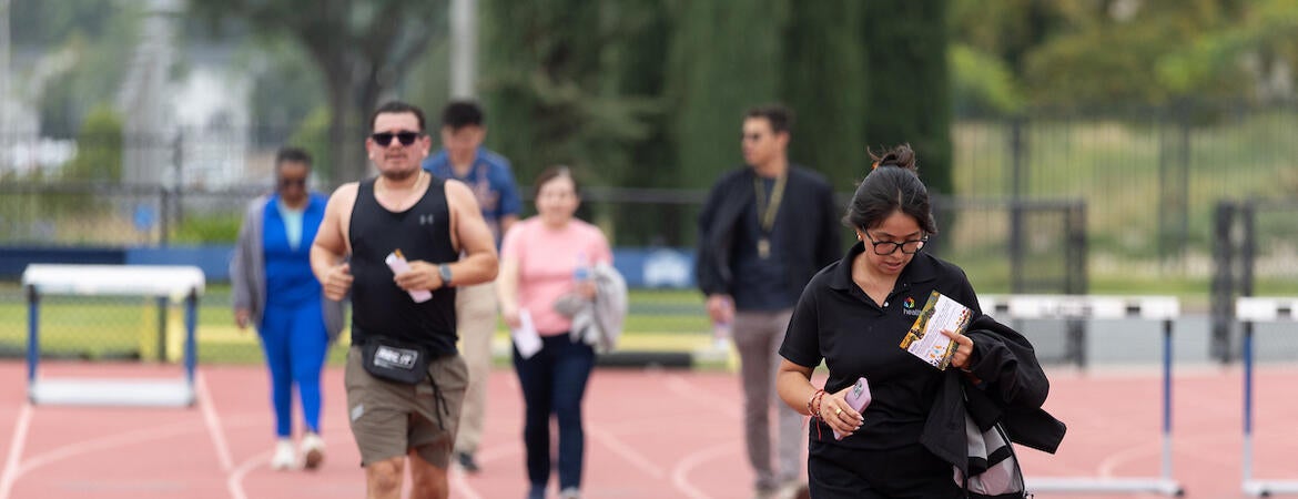 Runners and walkers at track
