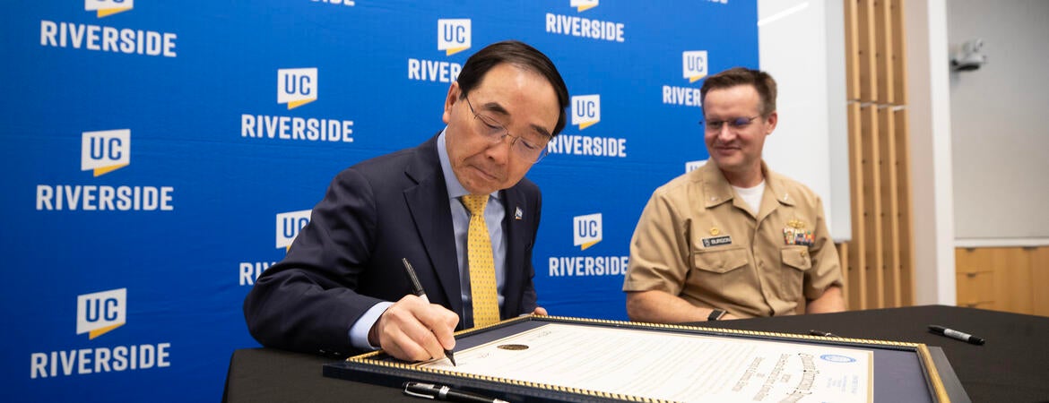 chancellor and commander signing