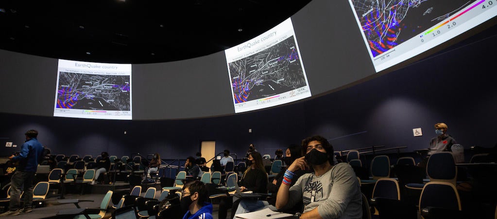 students in round lecture hall