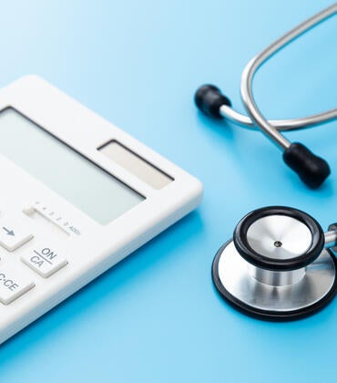 calculator and stethoscope