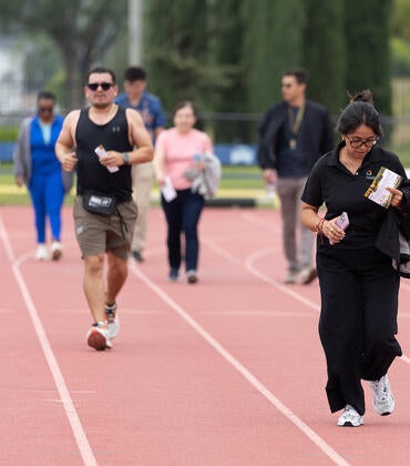 Runners and walkers at track
