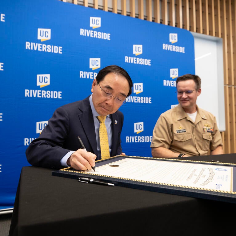chancellor and commander signing