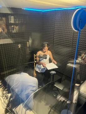 Camila Acosta in recording booth