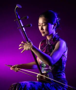 Chuan Qin performing erhu