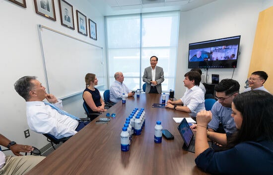 Richard Seto, vice chair of the Department of Physics and Astronomy, introduced several faculty members to Congressman Mark Takano.