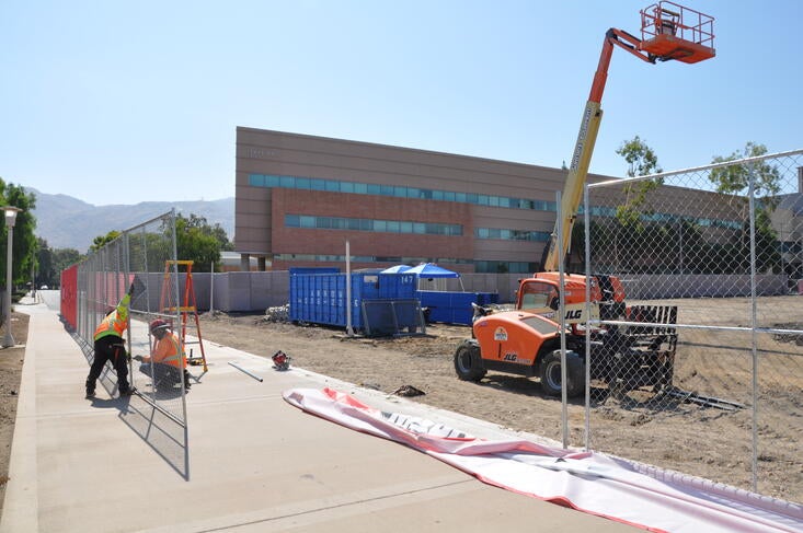 Crews put up fencing