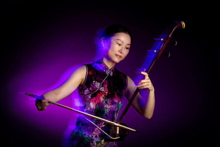 Chuan Qin performing erhu